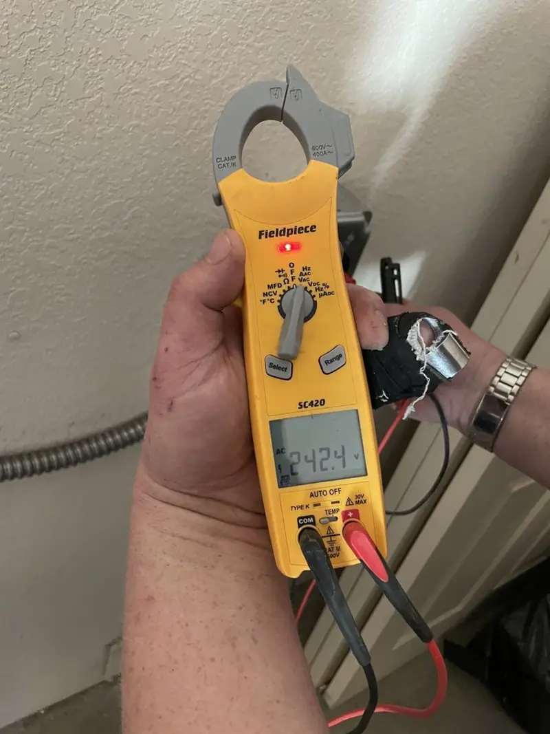 Voltage testing with clamp meter during Electrical Installation Services in West Haven